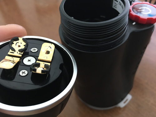 Inspecting the o-ring and battery cap.